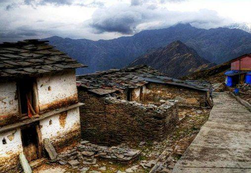 Scenic mountains in Uttarakhand representing regional migration issues
